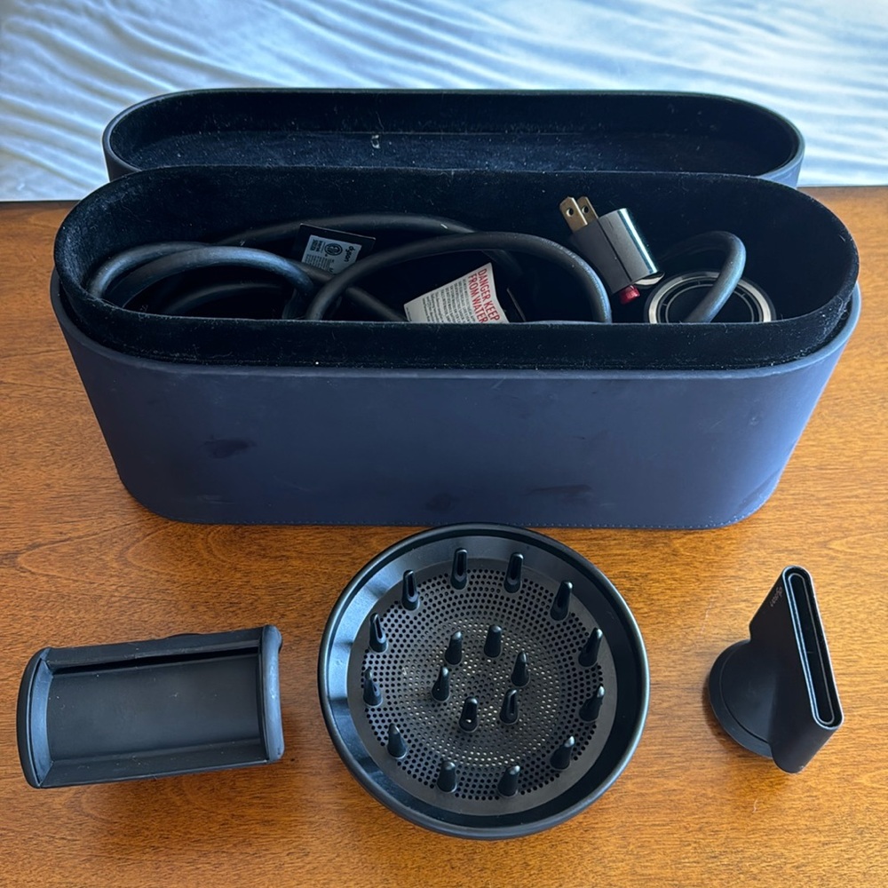 Dyson supersonic hair dryer with attachments and case